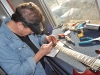 Joe doing a fingerboard correction.